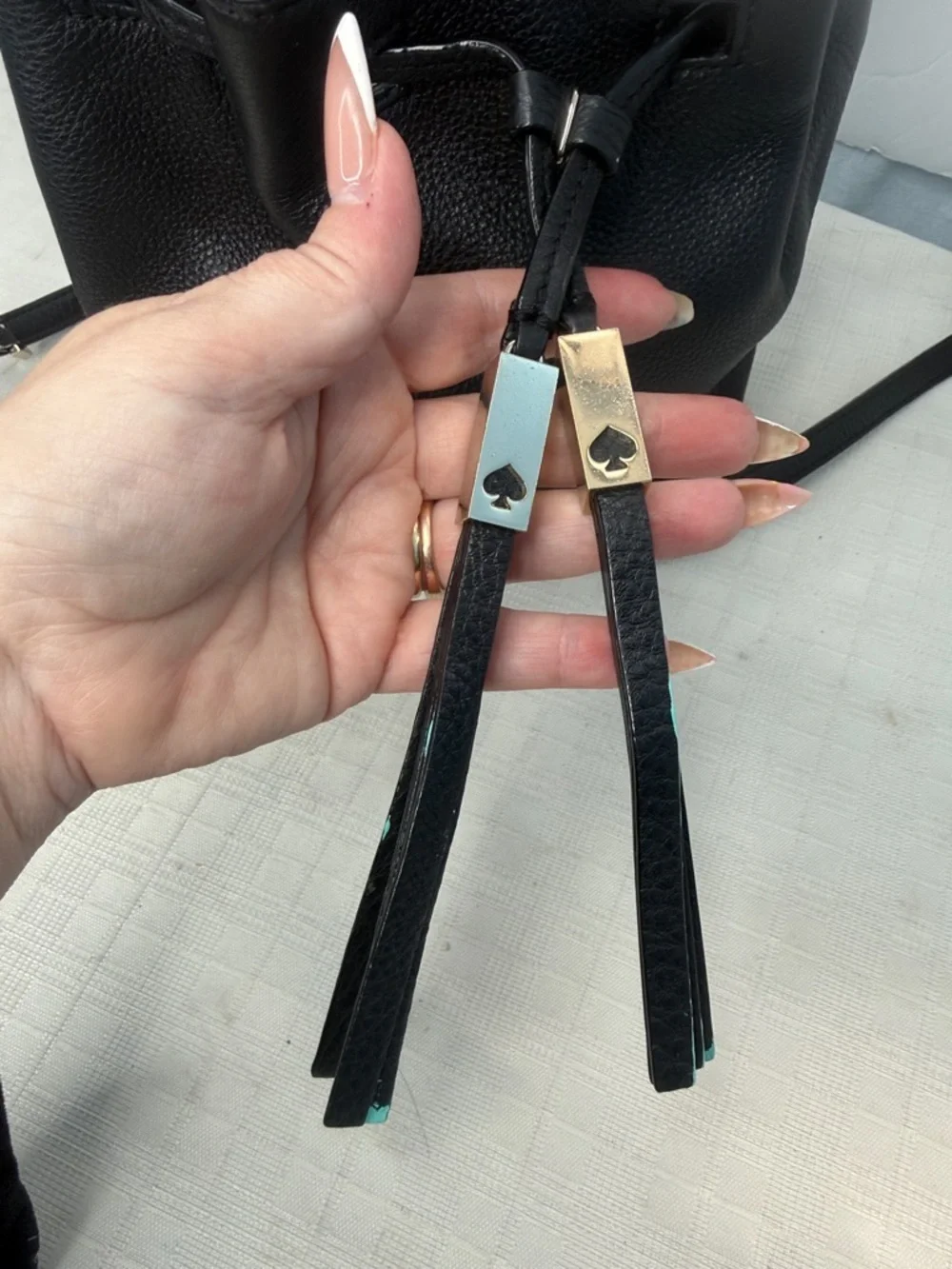 Kate Spade New York drawstring bucket bag, from the Grey Street  Tiny Cooper